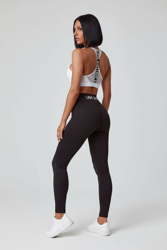 Black women’s lightweight gym sports bra side profile with breathable stretch fit - AresFit
