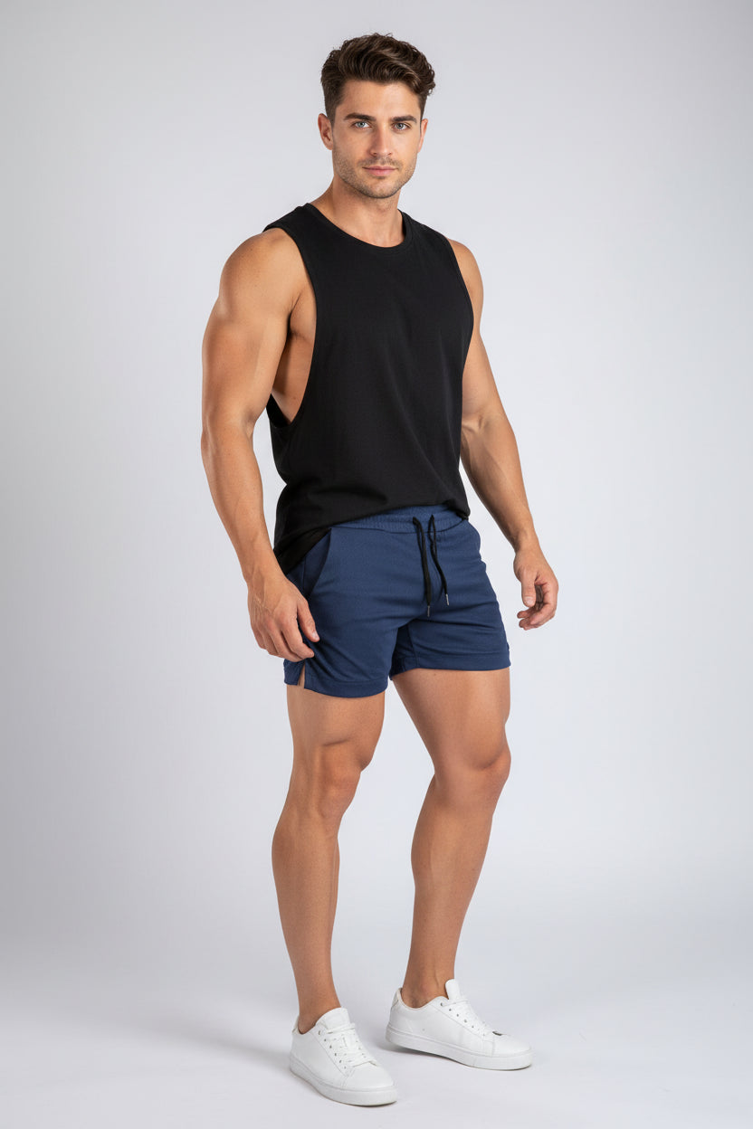 Navy blue shorts with a drawstring on a white background