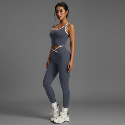Woman wearing a blue athletic outfit on a beige background - Aresfit