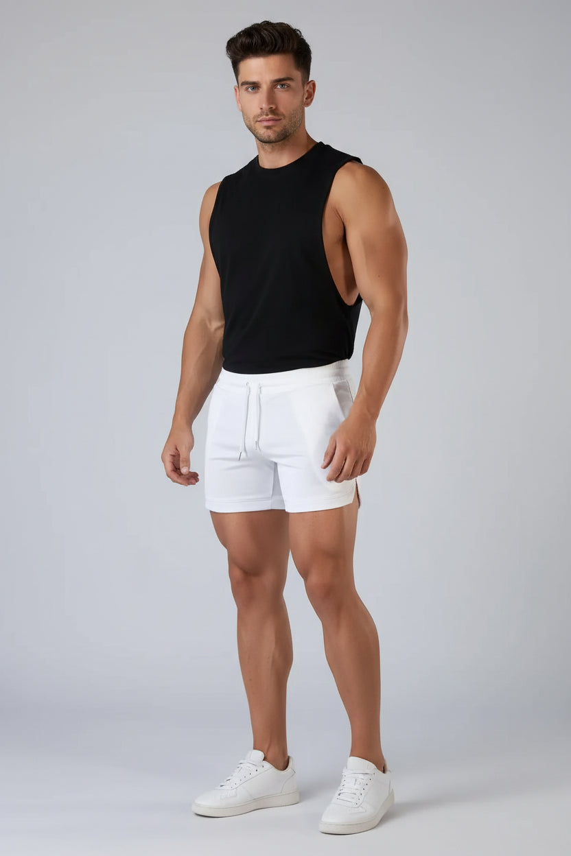 White shorts with a drawstring on a plain background