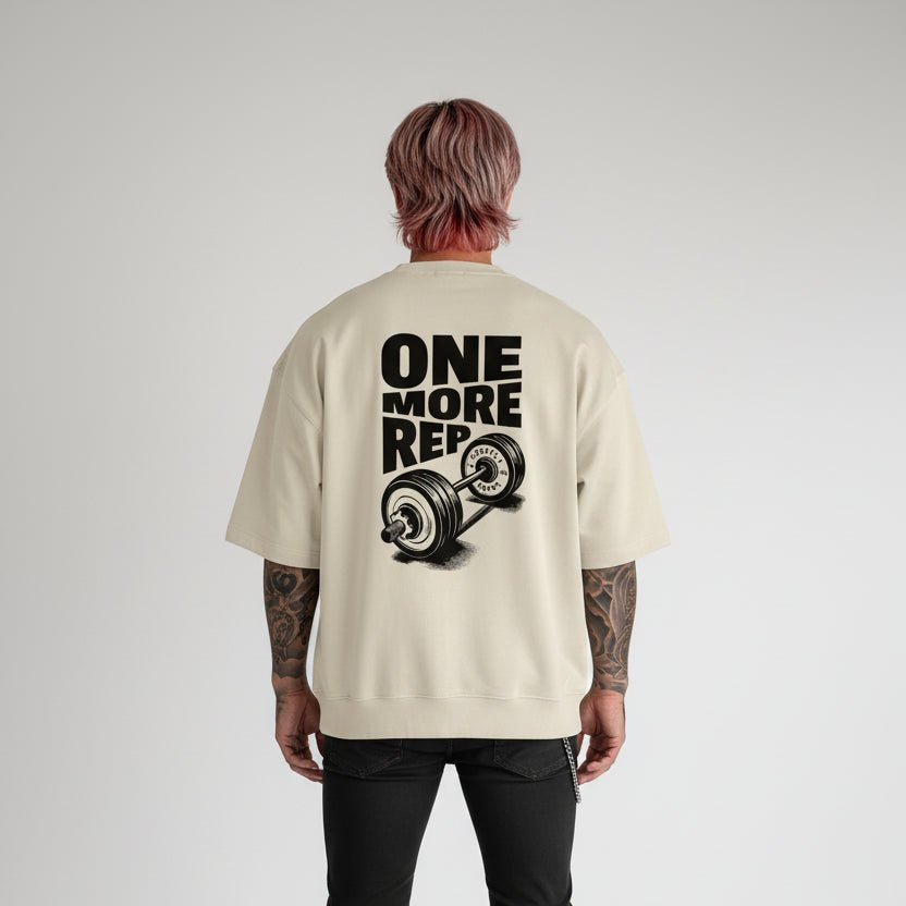 Men’s beige oversized gym tee with One More Rep back print - AresFit