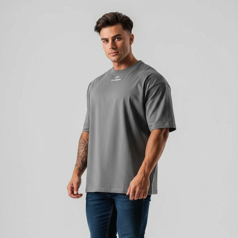 Men's dark gray oversized cotton gym t-shirt with relaxed fit and minimalist logo design - AresFit