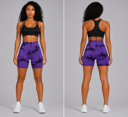Woman wearing a black sports bra and purple shorts with black floral pattern, shown from front and back on a gray background - Aresfit