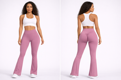 Woman wearing a white sports bra and pink flared leggings on a white background