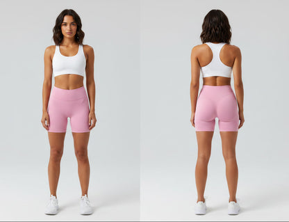 Woman wearing a white sports bra and pink shorts, shown from front and back on a light gray background - Aresfit
