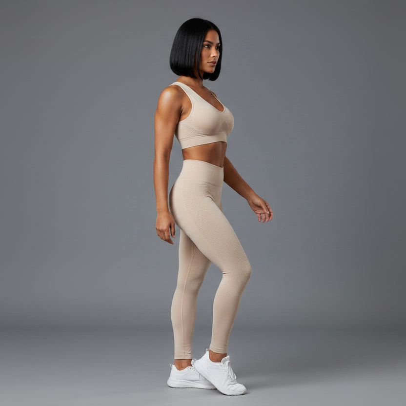 Women’s beige support sports bra side profile with breathable stretch fabric - AresFit
