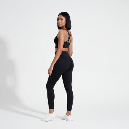 Black women’s cross back sports bra front view for gym and fitness sessions - AresFit