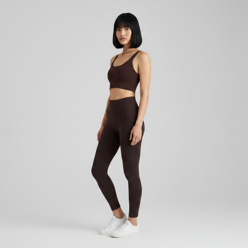 Dark brown women’s cross back sports bra with flexible stretch support - AresFit