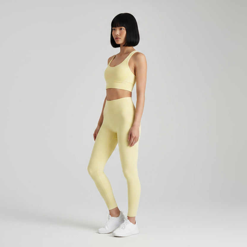 Women’s light yellow cross back sports bra for yoga and gym workouts - AresFit