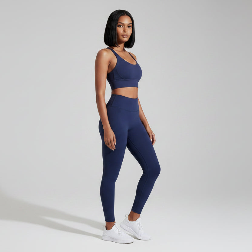Women’s navy cross back sports bra front view for gym and cardio workouts - AresFit