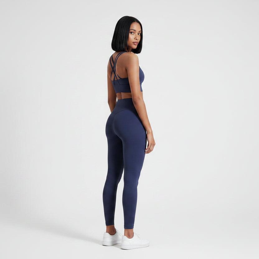 Women’s slate blue cross back gym sports bra side profile with stretch support - AresFit