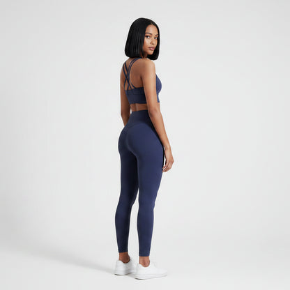 Women’s slate blue cross back gym sports bra side profile with stretch support - AresFit