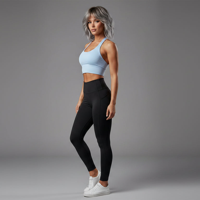 Women’s light blue halter neck gym top with fitted workout style - AresFit