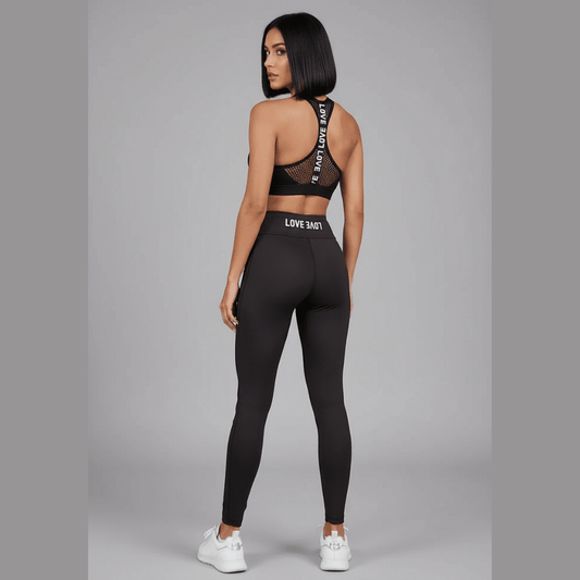 Women’s black racerback sports bra rear view with letter back detail for gym training - AresFit