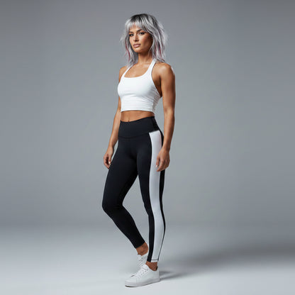 Side view of women’s white longline halter tank top with black leggings - AresFit