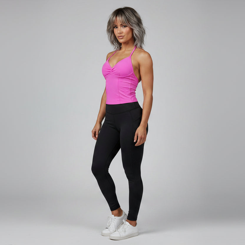 Side view of women’s hot pink longline strappy workout top - AresFit