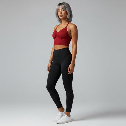 Side view of women’s dark red longline strappy tank top - AresFit