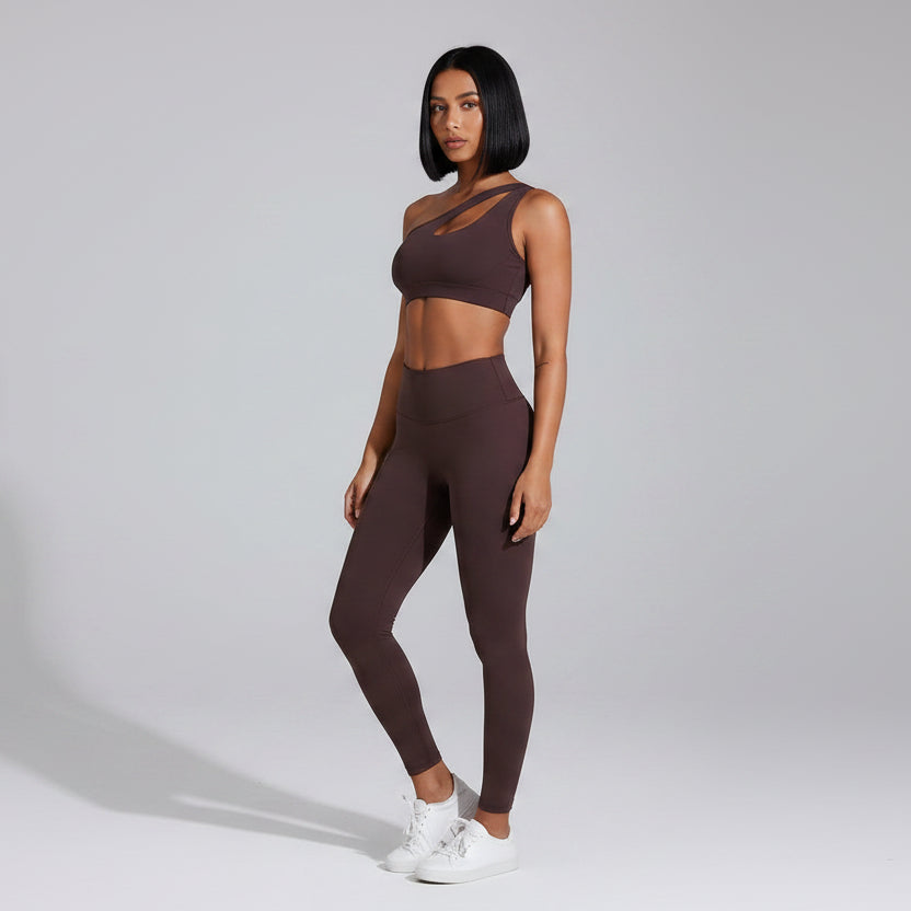 Women’s brown asymmetrical sports bra front view for fitness and activewear - AresFit