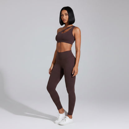 Women’s brown asymmetrical sports bra front view for fitness and activewear - AresFit