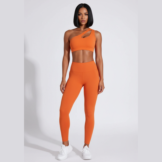 Women’s orange one shoulder sports bra front view for gym training and yoga workouts - AresFit
