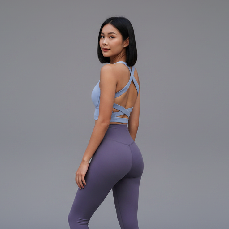 Women’s gray seamless sports bra rear view with cross back support fit - AresFit