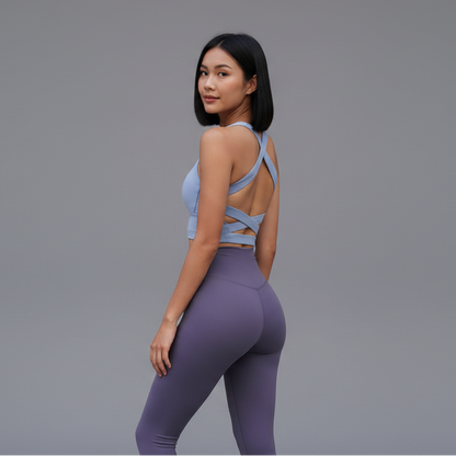 Women’s gray seamless sports bra rear view with cross back support fit - AresFit