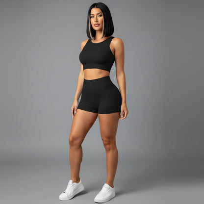 Women’s black seamless workout set with fitted activewear shorts - AresFit