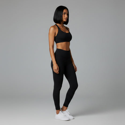Women’s black seamless halter sports bra side profile with stretch support - AresFit