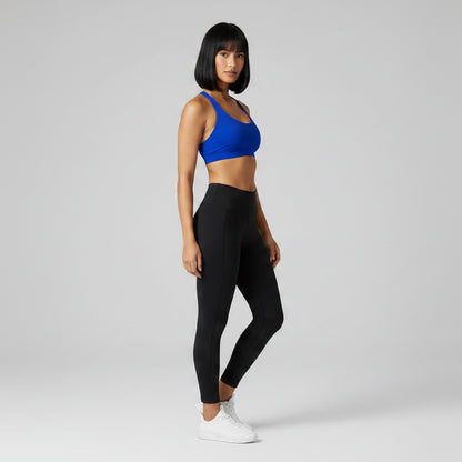 Blue and black women’s seamless halter sports bra side profile with breathable fit - AresFit