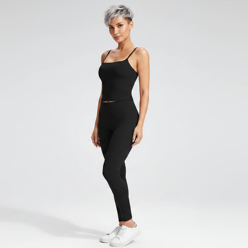 Side view of women’s black square neck gym top with breathable workout fit - AresFit