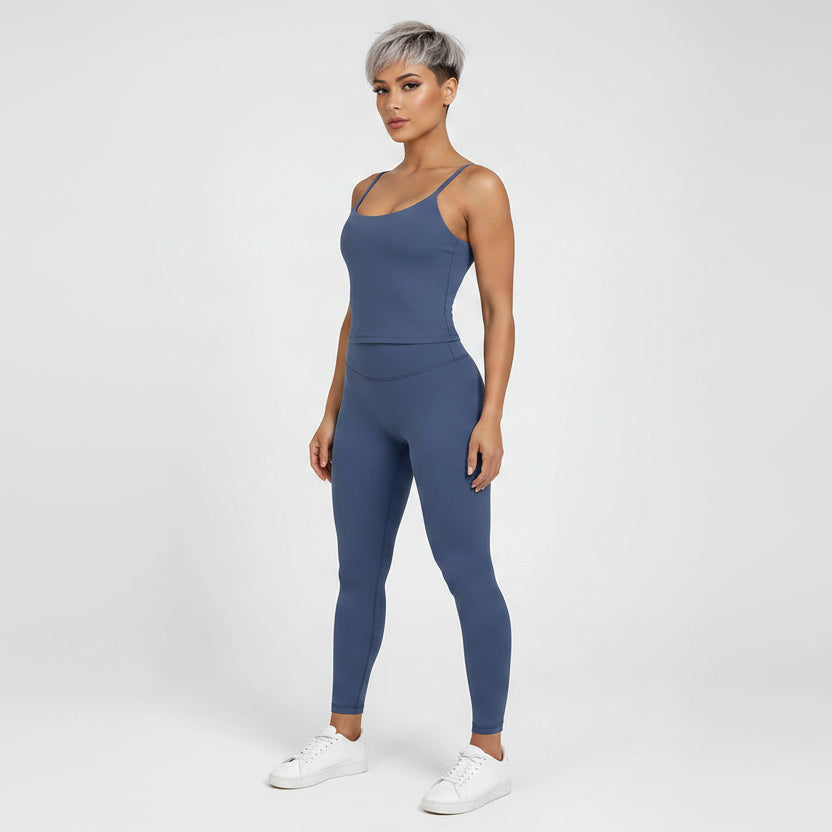 Side view of women’s blue square neck gym top with wide leg activewear pants - AresFit