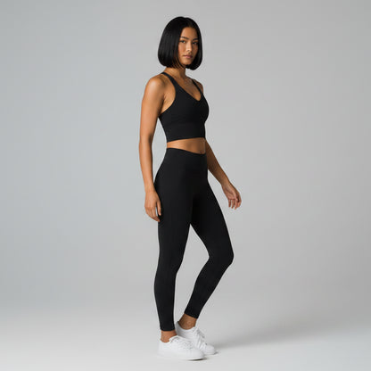 Black women’s U-back sports bra front view for gym and fitness sessions - AresFit