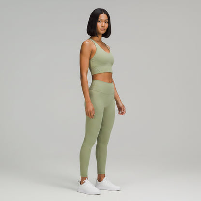 Women’s green U-back sports bra front view for yoga and cardio workouts - AresFit