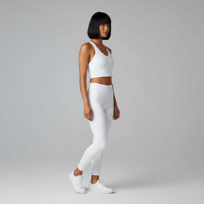 Women’s white U-back sports bra front view with lightweight stretch support - AresFit