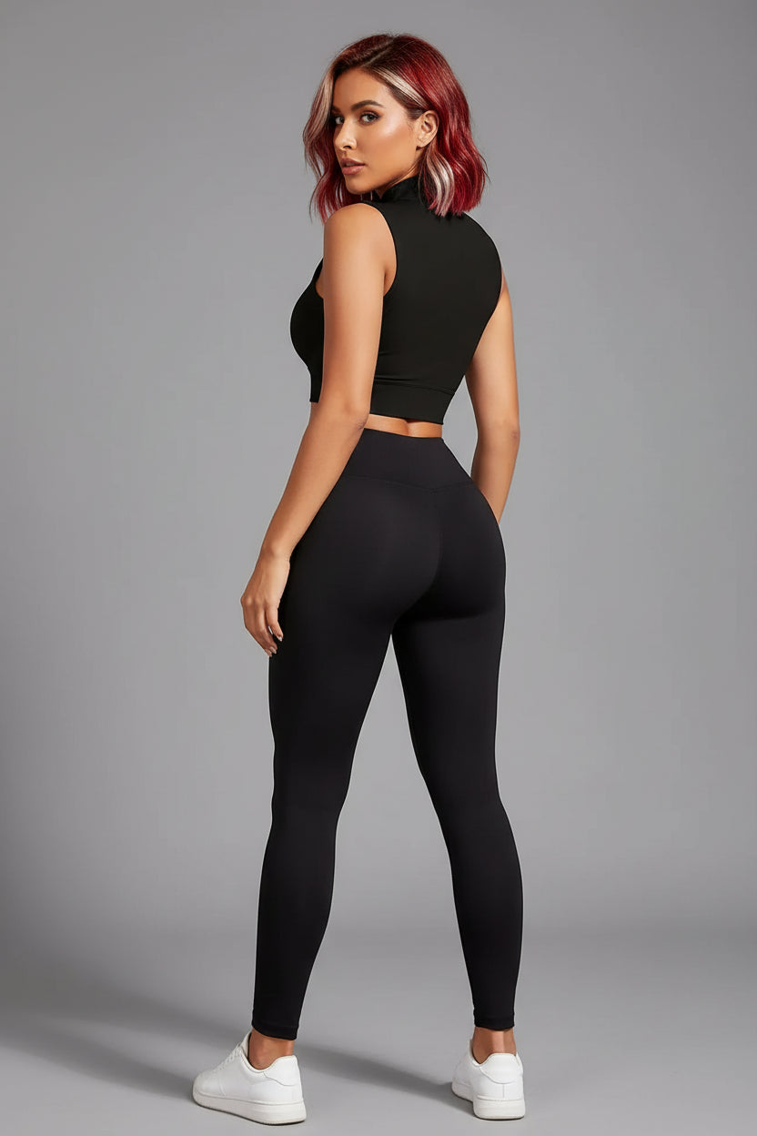Women’s black zip front crop top with black leggings activewear set front view - AresFit