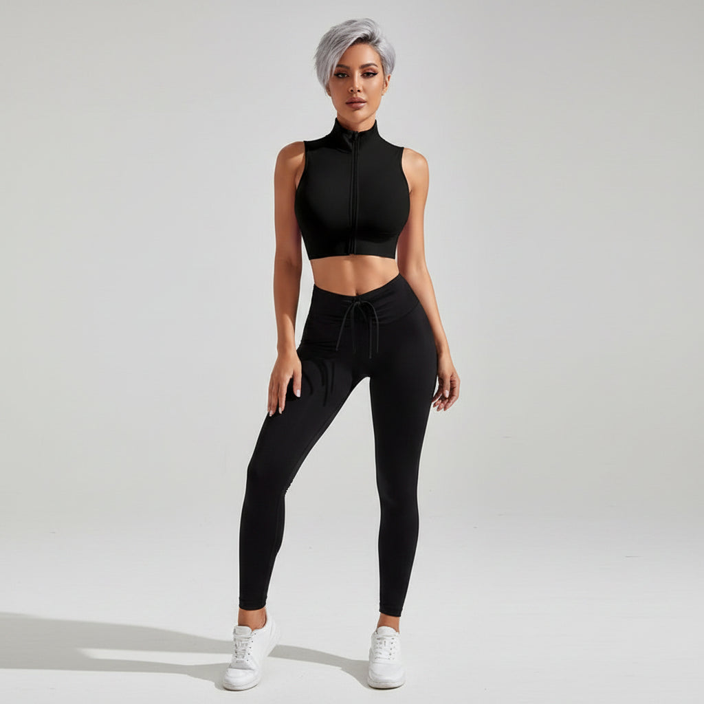 Women’s black sleeveless zip front crop top and leggings side profile - AresFit