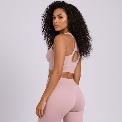 Women’s pink gym sports bra rear profile with breathable supportive design - AresFit
